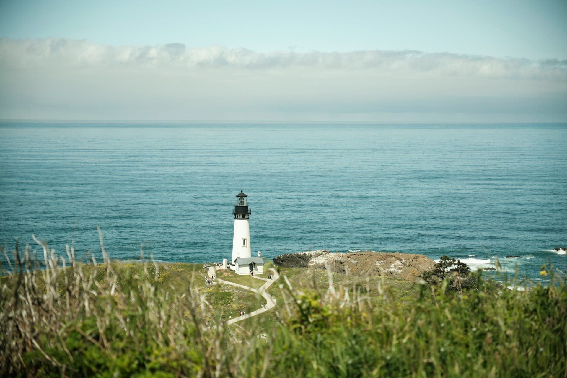 Lighthouse in front of the ocean